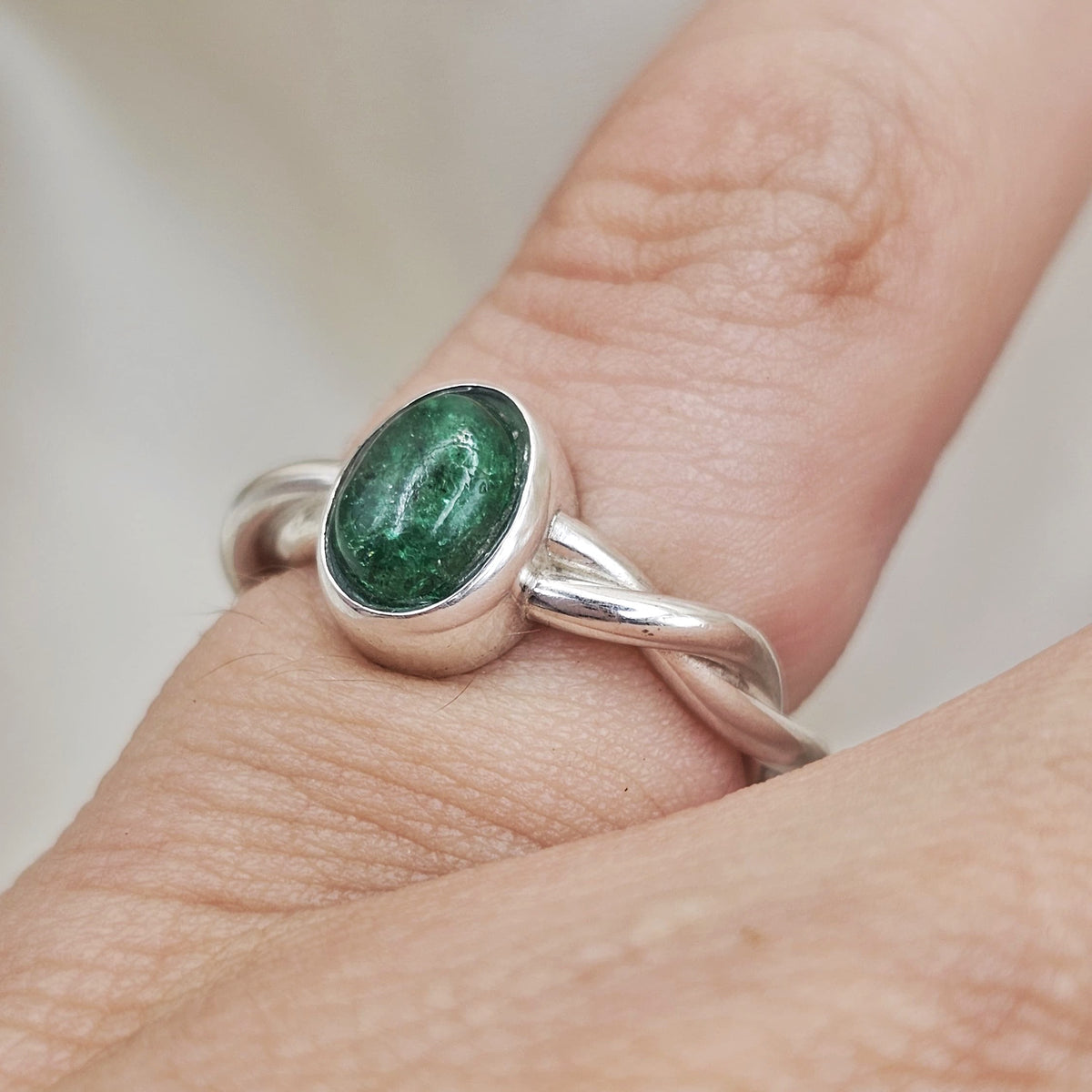 Emerald Twist Ring